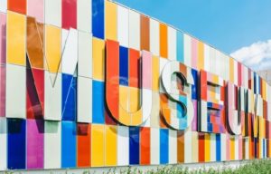The word Museum in colorful architecture found on the side of building